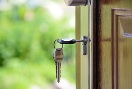 front door with keys in lock