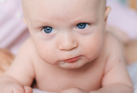 baby with an incredulous expression