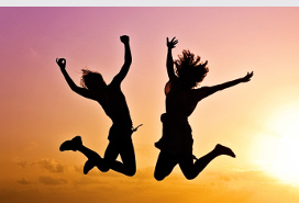 two people in silhouette jumping for joy.jpg