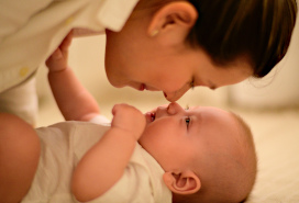 mother and baby nose-to-nose