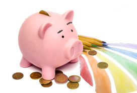 piggy bank with rainbow drawn on the surface at its feet, scattered coins