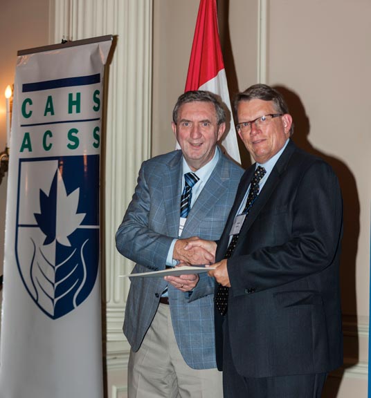 William Avison accepts CAHS fellowship